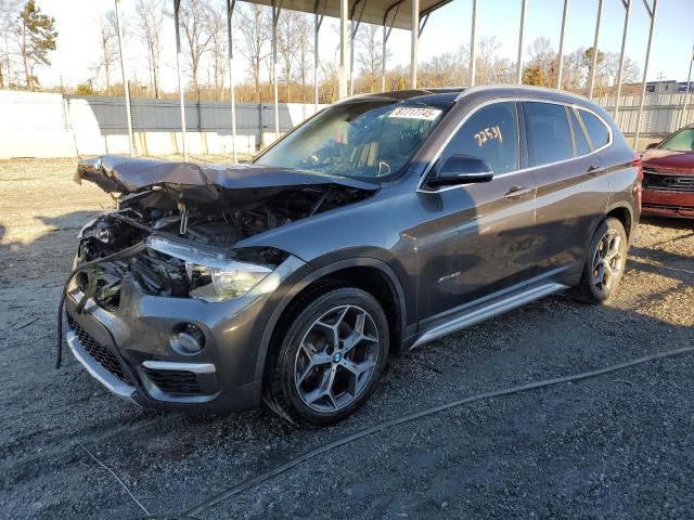 BMW X1 XDRIVE2 2018 with VIN WBXHT3C36J5K31963 - Photo from auction
