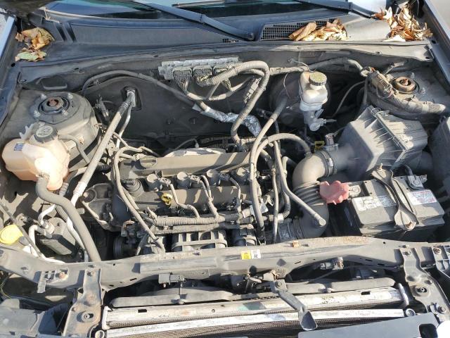 Photo 12 from auction – 2011 FORD ESCAPE LIM with VIN 1FMCU0E79BKC39766