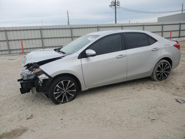 TOYOTA COROLLA L 2018 with VIN 5YFBURHE5JP820437 - Photo from auction