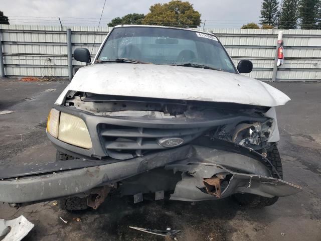 Foto 5 de la subasta – 2003 FORD F150 con VIN 1FTRF17273NA15430