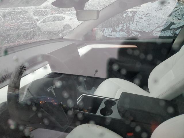 Photo 9 from auction – 2023 TESLA MODEL Y with VIN 7SAYGAEE0PF888028