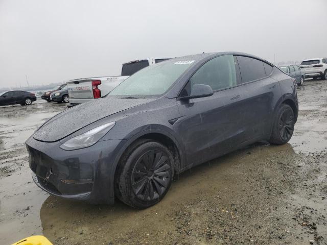 TESLA MODEL Y 2024 with VIN 7SAYGDEDXRF055185 - Photo from auction