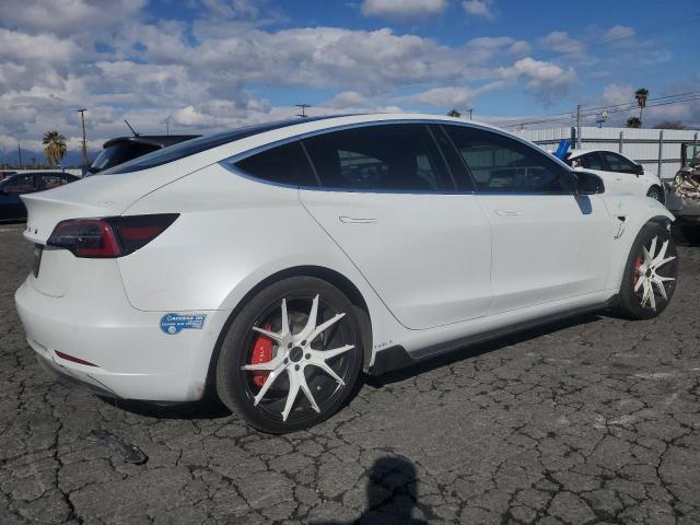Снимка 3 от търг – 2019 TESLA MODEL 3 с VIN 5YJ3E1EA5KF485617