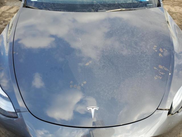 Photo 11 from auction – 2022 TESLA MODEL Y with VIN 7SAYGDEE5NF423484