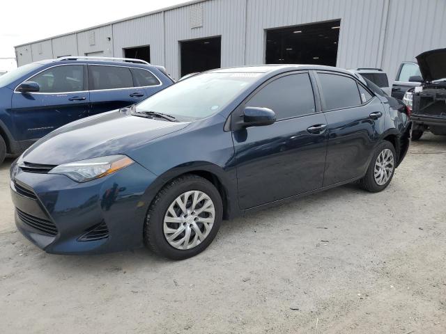 TOYOTA COROLLA L 2017 with VIN 5YFBURHE1HP576330 - Photo from auction