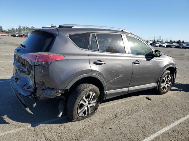 Photo 3 from auction – 2017 TOYOTA RAV4 LE with VIN JTMZFREV0HJ701917