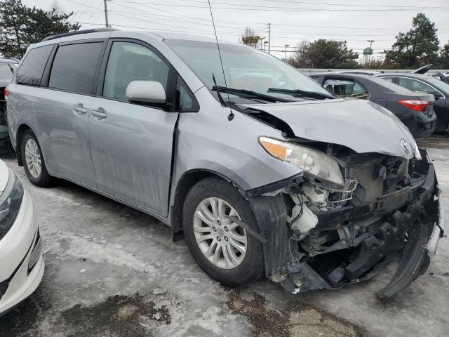 Photo 4 from auction – 2014 TOYOTA SIENNA XLE with VIN 5TDYK3DC7ES514094