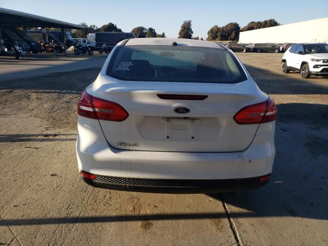 Photo 6 from auction – 2015 FORD FOCUS S with VIN 1FADP3E27FL256741