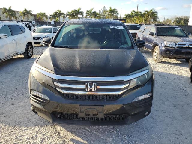 Photo 5 from auction – 2016 HONDA PILOT EXL with VIN 5FNYF6H52GB093314