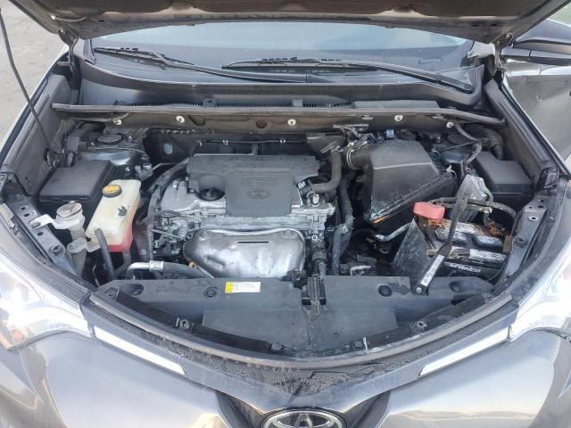 Photo 11 from auction – 2018 TOYOTA RAV4 LE with VIN 2T3ZFREV7JW458646