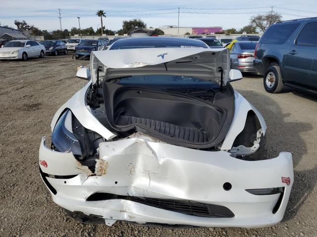 Снимка 5 от търг – 2022 TESLA MODEL 3 с VIN 5YJ3E1EA2NF360238