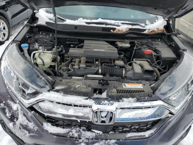 Photo 12 from auction – 2018 HONDA CR-V with VIN 7FARW2H89JE092129