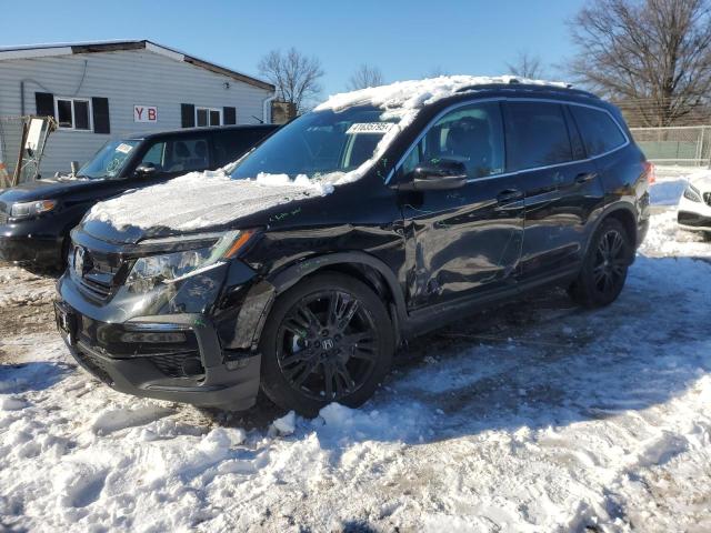 HONDA PILOT SE 2022 with VIN 5FNYF6H29NB065321 - Photo from auction