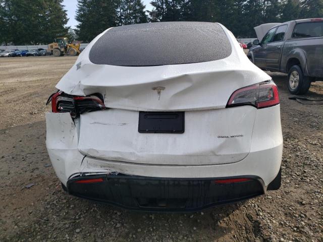Photo 6 from auction – 2023 TESLA MODEL Y with VIN 7SAYGDEE9PF623156