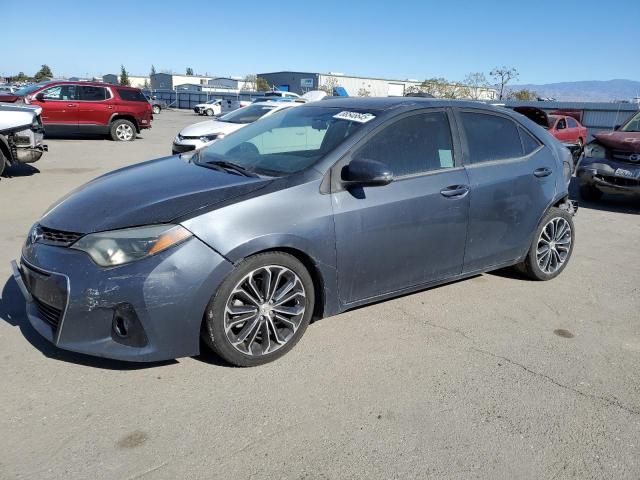 TOYOTA COROLLA L 2015 con VIN 5YFBURHE2FP199486 - Foto de la subasta