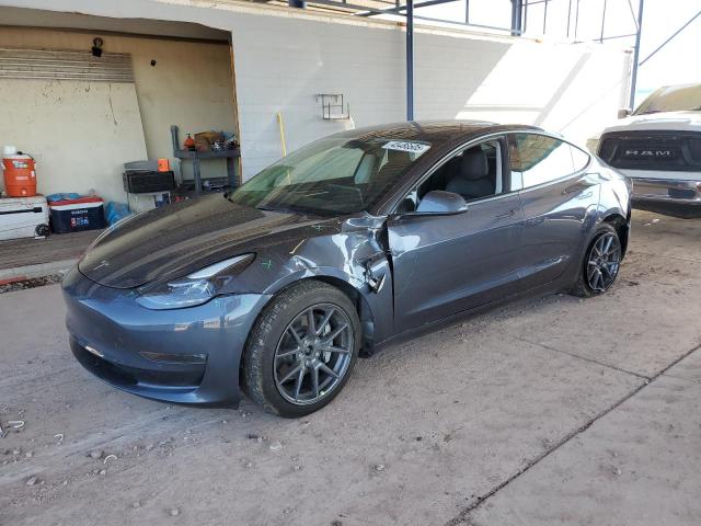 TESLA MODEL 3 2022 with VIN 5YJ3E1EB9NF341128 - Photo from auction