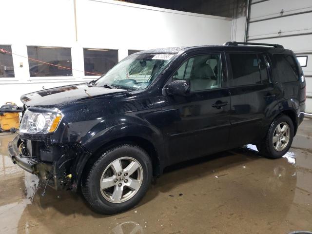 HONDA PILOT EXLN 2011 with VIN 5FNYF4H78BB101611 - Photo from auction