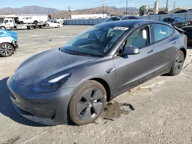 TESLA MODEL 3 2023 with VIN 5YJ3E1EAXPF661651 - Photo from auction