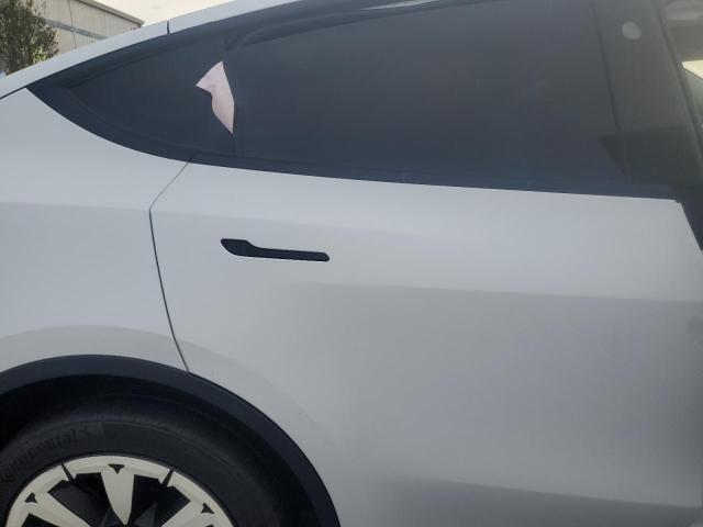 Photo 11 from auction – 2023 TESLA MODEL Y with VIN 7SAYGAEE3PF810889