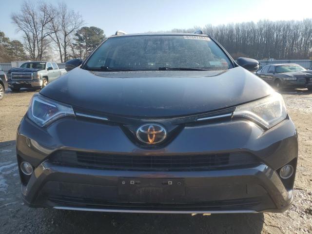 Photo 5 from auction – 2017 TOYOTA RAV4 XLE with VIN JTMRFREV8HJ117846