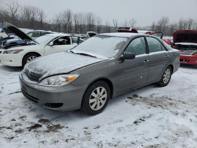 TOYOTA CAMRY LE 2004 with VIN 4T1BE32KX4U897493 - Photo from auction