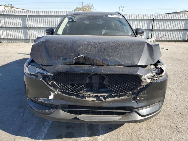 Photo 5 from auction – 2021 MAZDA CX-5 GRAND with VIN JM3KFBDM0M1440484