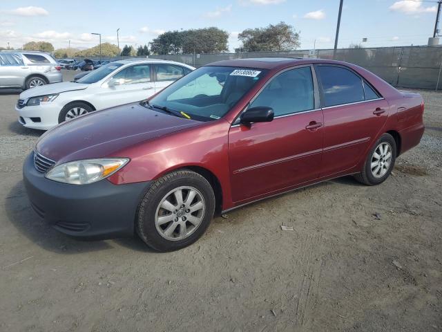 TOYOTA CAMRY LE 2002 with VIN 4T1BF30K62U031285 - Photo from auction