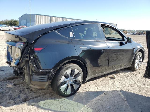 Снимка 3 от търг – 2023 TESLA MODEL Y с VIN 7SAYGAEE6PF805153
