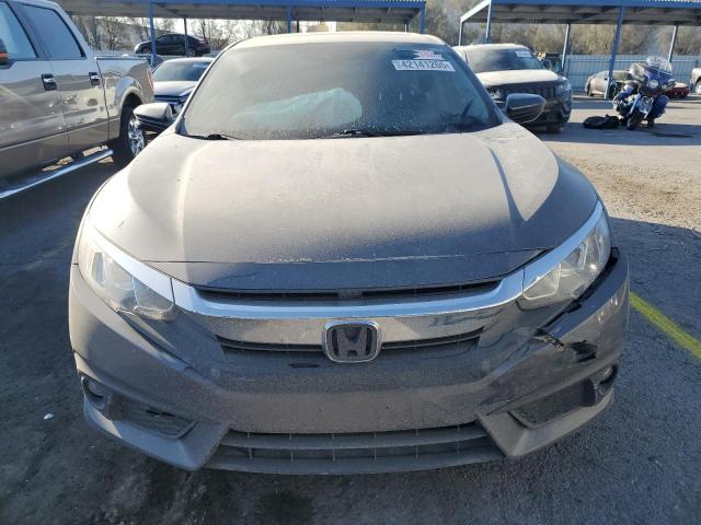 Photo 5 from auction – 2018 HONDA CIVIC EX with VIN JHMFC1F85JX018408
