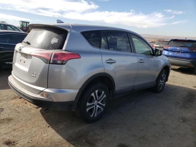 Photo 3 from auction – 2018 TOYOTA RAV4 LE with VIN JTMBFREV8JJ196491