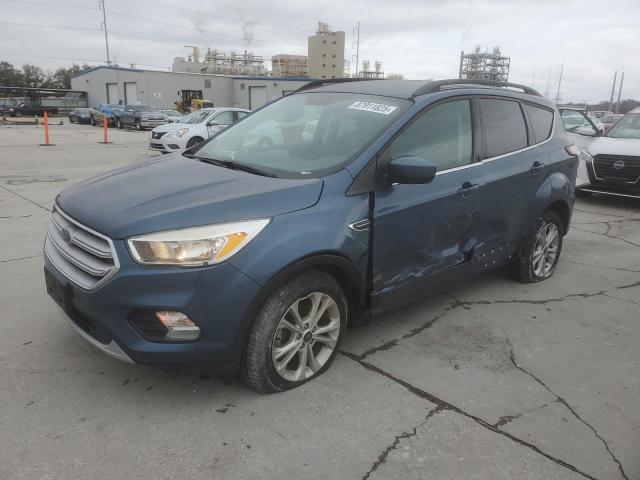 FORD ESCAPE SE 2018 with VIN 1FMCU0GDXJUA97076 - Photo from auction