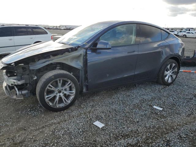 TESLA MODEL Y 2021 with VIN 5YJYGAEE0MF160069 - Photo from auction