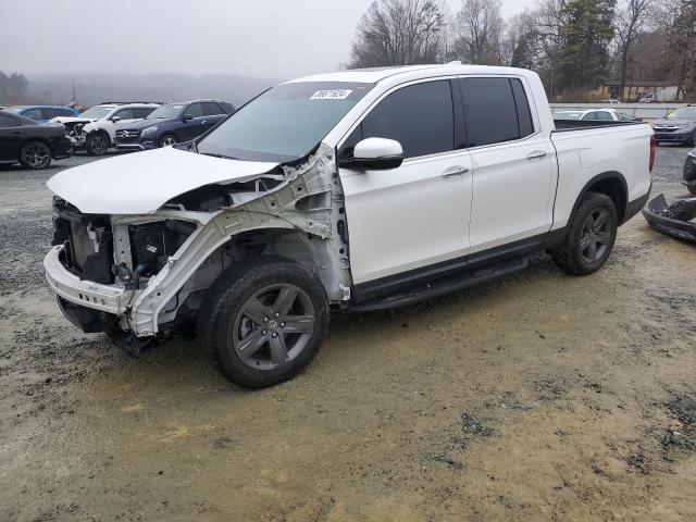 HONDA RIDGELINE 2023 with VIN 5FPYK3F74PB007779 - Photo from auction