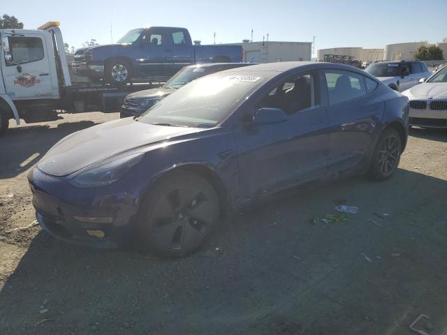 TESLA MODEL 3 2022 with VIN 5YJ3E1EB7NF334503 - Photo from auction
