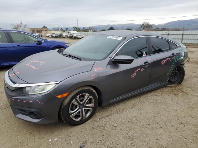 HONDA CIVIC LX 2018 with VIN 2HGFC2F57JH607186 - Photo from auction