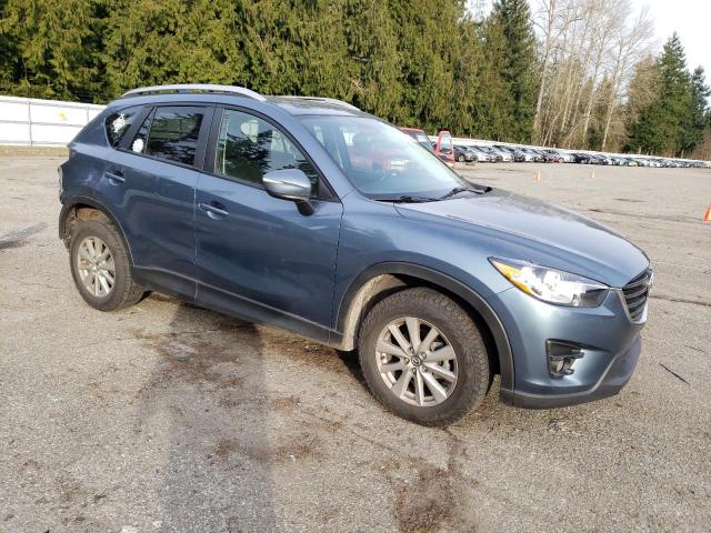 Photo 4 from auction – 2016 MAZDA CX-5 TOURI with VIN JM3KE4CY8G0648142
