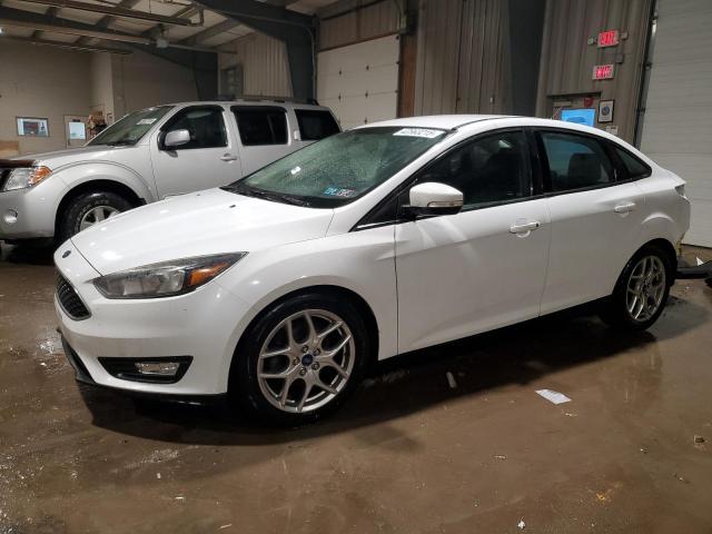 FORD FOCUS SE 2015 with VIN 1FADP3F23FL274054 - Photo from auction