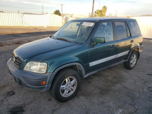 HONDA CR-V EX 2000 with VIN JHLRD1861YC063518 - Photo from auction