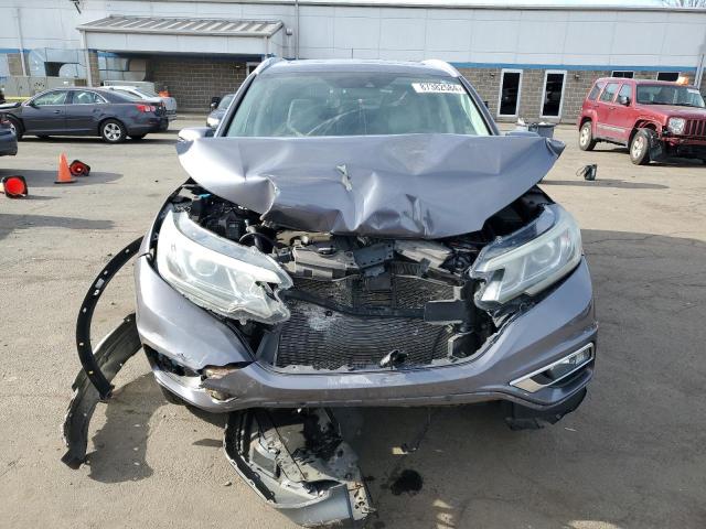 Photo 5 from auction – 2016 HONDA CR-V TOURI with VIN 5J6RM4H91GL036627