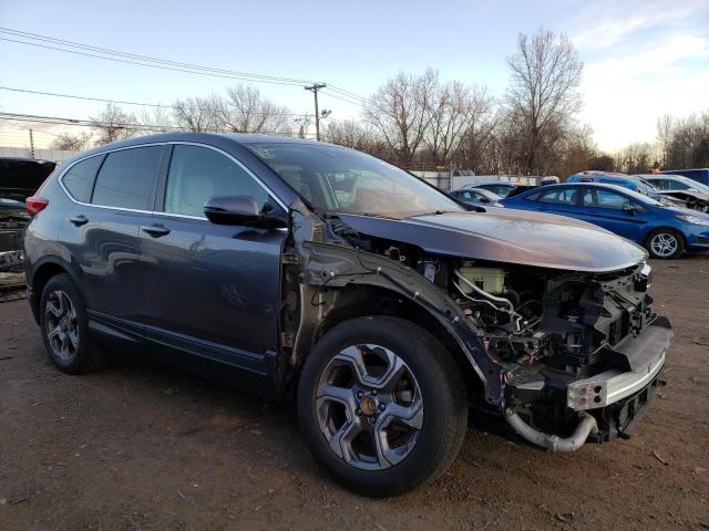 Photo 4 from auction – 2017 HONDA CR-V EX with VIN 5J6RW2H58HL006182
