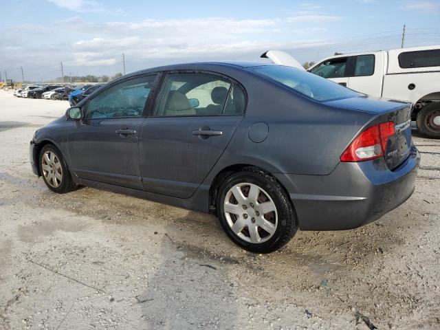 Photo 2 from auction – 2011 HONDA CIVIC LX with VIN 19XFA1F57BE007571