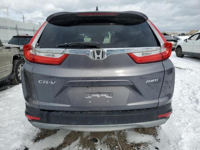 Photo 6 from auction – 2018 HONDA CR-V with VIN 7FARW2H89JE092129