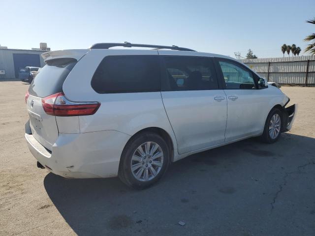 Photo 3 from auction – 2015 TOYOTA SIENNA XLE with VIN 5TDDK3DC7FS122121