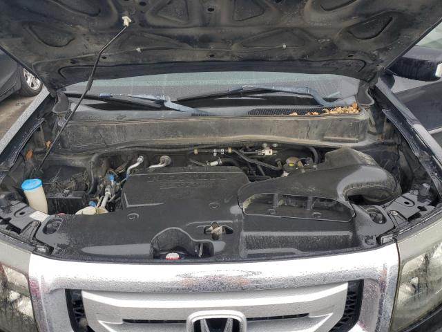 Photo 12 from auction – 2011 HONDA PILOT TOUR with VIN 5FNYF3H97BB057516