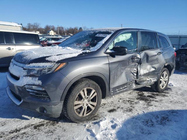 HONDA PILOT LX 2017 with VIN 5FNYF6H17HB002102 - Photo from auction