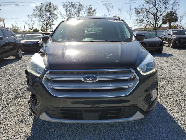 Photo 5 from auction – 2018 FORD ESCAPE SEL with VIN 1FMCU9HD8JUB04934