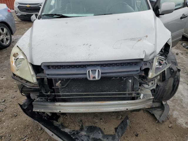 Photo 12 from auction – 2003 HONDA PILOT EXL with VIN 2HKYF18563H583995