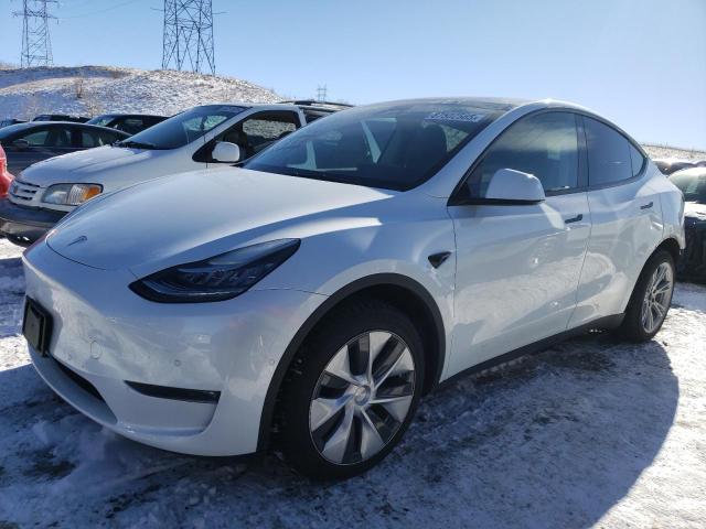 TESLA MODEL Y 2022 with VIN 7SAYGAEE8NF426278 - Photo from auction