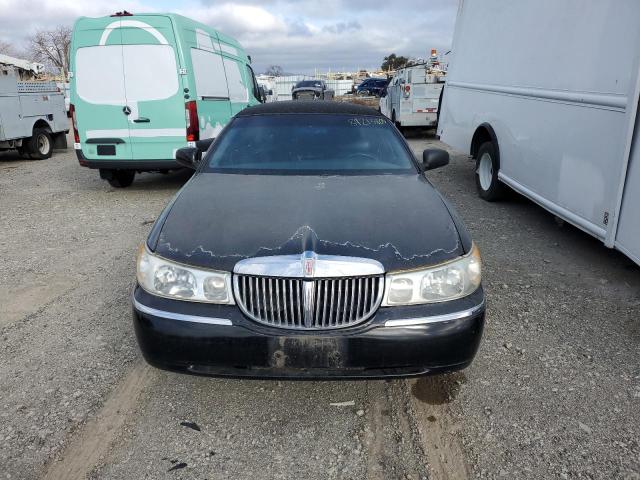 Photo 5 from auction – 2001 LINCOLN TOWN CAR E with VIN 1L1FM81W51Y704307