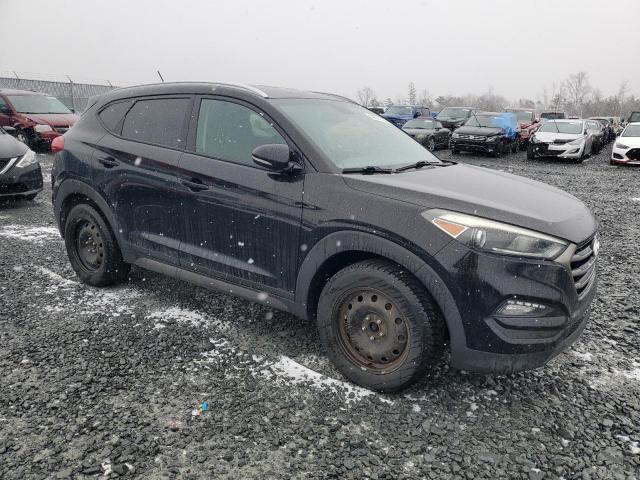 Photo 4 from auction – 2016 HYUNDAI TUCSON LIM with VIN KM8J33A44GU239323